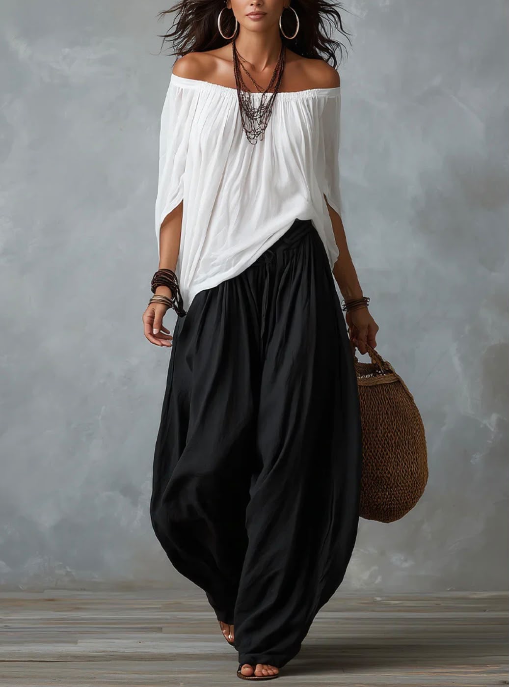 Mara • Conjunto blusa blanca hombros descubiertos y pantalón palazzo negro