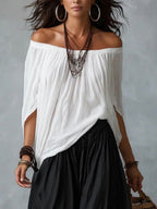 Mara • Conjunto blusa blanca hombros descubiertos y pantalón palazzo negro